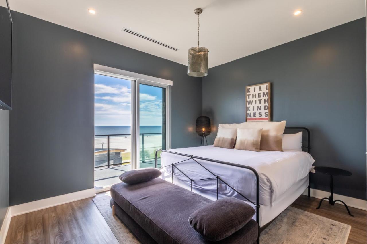 Luxury 4 Bedroom Gulf View Condo, Rooftop Pool, Right Next To The Hangout! Holiday home *